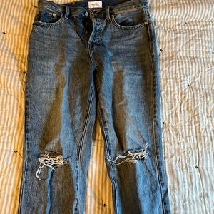 Pistola button fly jeans with knee rip.